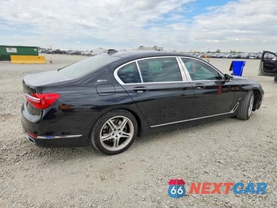 Trzecie zdjęcie samochodu z tyłu: 2018 BMW 740 XE VIN:WBA7J2C52JG938408 - miniatura