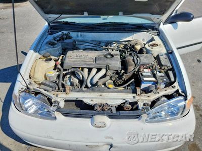 Zdjęcie 11 z 12 samochodu: 2000 CHEVROLET GEO PRIZM BASE VIN:1Y1SK5282YZ422079 - miniatura