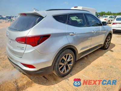 Trzecie zdjęcie samochodu z tyłu: 2018 HYUNDAI SANTA FE SPORT 2.0T ULTIMATE VIN:5XYZW4LA3JG556493 - miniatura