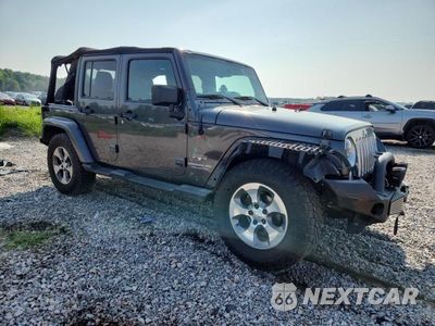 Czwarte zdjęcie samochodu z boku: 2016 JEEP WRANGLER UNLIMITED SAHARA VIN:1C4BJWEG9GL174947 - miniatura