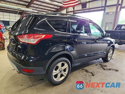 Trzecie zdjęcie samochodu z tyłu: 2016 FORD ESCAPE SE VIN:1FMCU9GX5GUA41568 - miniatura