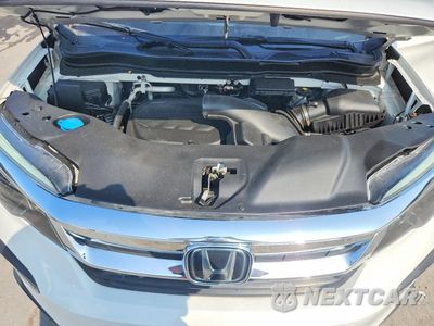 Zdjęcie 12 z 14 samochodu: 2020 HONDA PILOT EXL VIN:5FNYF6H57LB069617 - miniatura