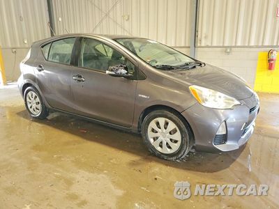 Czwarte zdjęcie samochodu z boku: 2014 TOYOTA PRIUS C THREE VIN:JTDKDTB36E1560600 - miniatura