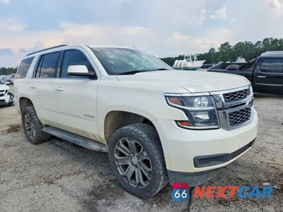 Czwarte zdjęcie samochodu z boku: 2015 CHEVROLET TAHOE C1500 LT VIN:1GNSCBKC6FR548616 - miniatura