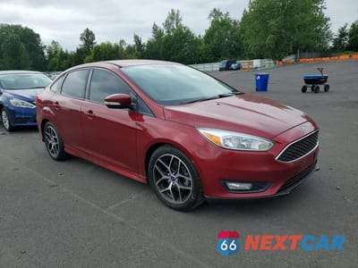 Czwarte zdjęcie samochodu z boku: 2015 FORD FOCUS SE VIN:1FADP3F24FL281479 - miniatura