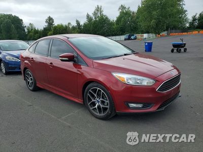 Czwarte zdjęcie samochodu z boku: 2015 FORD FOCUS SE VIN:1FADP3F24FL281479 - miniatura