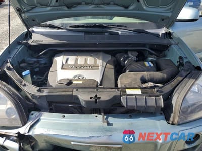 Zdjęcie 12 z 13 samochodu: 2007 HYUNDAI TUCSON SE/LIMITED VIN:KM8JN72D97U486241 - miniatura
