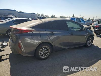 Trzecie zdjęcie samochodu z tyłu: 2021 TOYOTA PRIUS PRIME XLE VIN:JTDKAMFP5M3192134 - miniatura