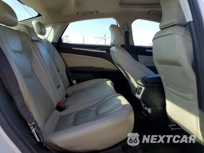 Zdjęcie 10 z 12 samochodu: 2016 FORD FUSION TITANIUM PHEV VIN:3FA6P0SU3GR320497 - miniatura