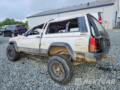Drugie zdjęcie samochodu z przodu: 1990 JEEP CHEROKEE SPORT VIN:1J4FJ87LXLL124862 - miniatura