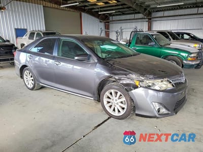 Czwarte zdjęcie samochodu z boku: 2014 TOYOTA CAMRY HYBRID XLE VIN:4T1BD1FK1EU138508 - miniatura