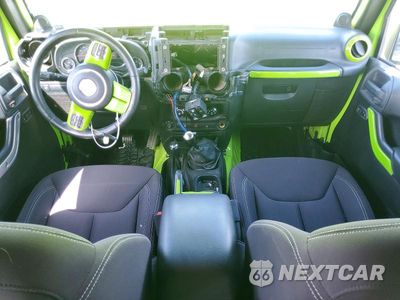Zdjęcie 8 z 12 samochodu: 2013 JEEP WRANGLER UNLIMITED RUBICON VIN:1C4BJWFG2DL505975 - miniatura