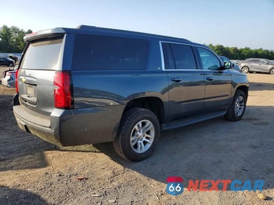Trzecie zdjęcie samochodu z tyłu: 2019 CHEVROLET SUBURBAN K1500 LT VIN:1GNSKHKC6KR349095 - miniatura