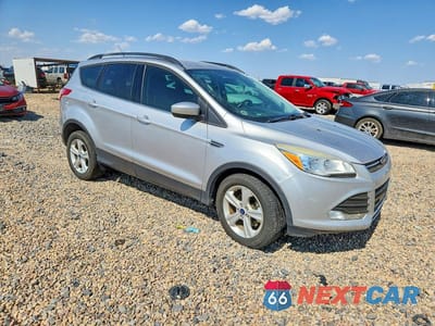 Czwarte zdjęcie samochodu z boku: 2014 FORD ESCAPE SE VIN:1FMCU0GX8EUC29817 - miniatura