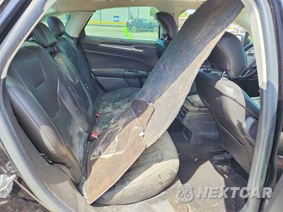 Zdjęcie 10 z 12 samochodu: 2014 FORD FUSION TITANIUM HEV VIN:3FA6P0RU1ER295909 - miniatura