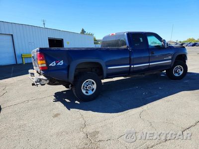 Trzecie zdjęcie samochodu z tyłu: 2001 GMC SIERRA K2500 HEAVY DUTY VIN:1GTHK29131E306358 - miniatura
