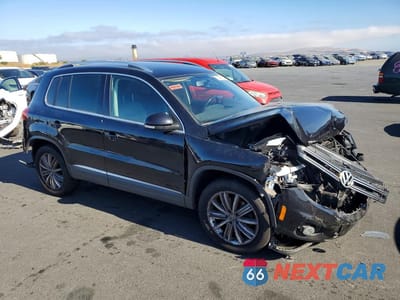 Czwarte zdjęcie samochodu z boku: 2012 VOLKSWAGEN TIGUAN VIN:WVGBV7AX5CW529407 - miniatura