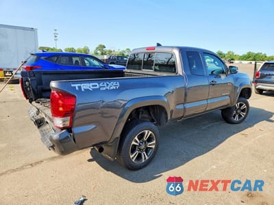 Trzecie zdjęcie samochodu z tyłu: 2016 TOYOTA TACOMA TRD SPORT VIN:5TFSZ5AN6GX044107 - miniatura