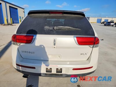 Zdjęcie 6 z 12 samochodu: 2013 LINCOLN MKX VIN:2LMDJ6JK3DBL35470 - miniatura