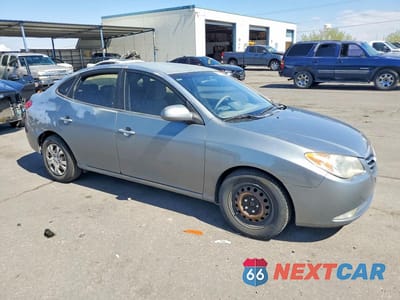 Czwarte zdjęcie samochodu z boku: 2010 HYUNDAI ELANTRA GLS VIN:KMHDU4AD5AU112068 - miniatura