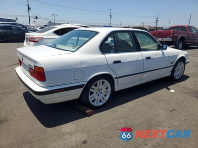 Trzecie zdjęcie samochodu z tyłu: 1995 BMW 525 I VIN:WBAHD5323SGB37770 - miniatura