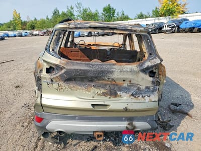 Zdjęcie 6 z 11 samochodu: 2013 FORD ESCAPE TITANIUM VIN:1FMCU9J98DUB21792 - miniatura