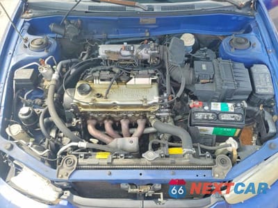 Zdjęcie 11 z 12 samochodu: 1997 MITSUBISHI MIRAGE LS VIN:JA3AY31C9VU006143 - miniatura