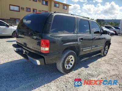 Trzecie zdjęcie samochodu z tyłu: 2004 CHEVROLET TAHOE C1500 VIN:1GNEC13V34J154462 - miniatura
