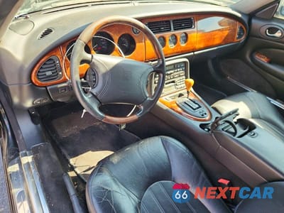 Zdjęcie 8 z 12 samochodu: 1999 JAGUAR XK8 VIN:SAJGX204XXC041884 - miniatura