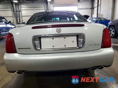 Zdjęcie 6 z 12 samochodu: 2000 CADILLAC DEVILLE VIN:1G6KD54YXYU260245 - miniatura