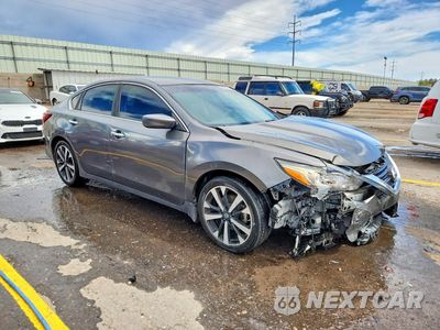 Czwarte zdjęcie samochodu z boku: 2018 NISSAN ALTIMA 2.5 SR VIN:1N4AL3AP6JC119640 - miniatura