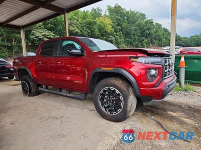Czwarte zdjęcie samochodu z boku: 2026 GMC CANYON AT4 VIN:1GTP2DEKXT1170827 - miniatura