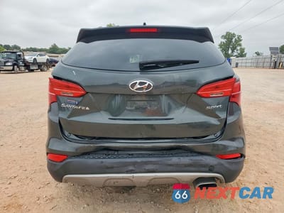 Zdjęcie 6 z 13 samochodu: 2014 HYUNDAI SANTA FE SPORT 2.4L VIN:5XYZU3LB4EG172088 - miniatura