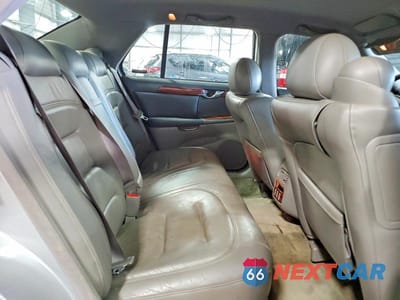 Zdjęcie 10 z 12 samochodu: 2000 CADILLAC DEVILLE VIN:1G6KD54YXYU260245 - miniatura