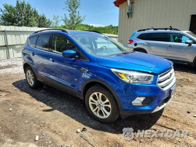 Czwarte zdjęcie samochodu z boku: 2018 FORD ESCAPE VIN:1FMCU9HD4JUB65696 - miniatura