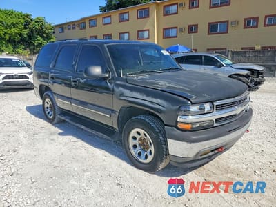 Czwarte zdjęcie samochodu z boku: 2004 CHEVROLET TAHOE C1500 VIN:1GNEC13V34J154462 - miniatura