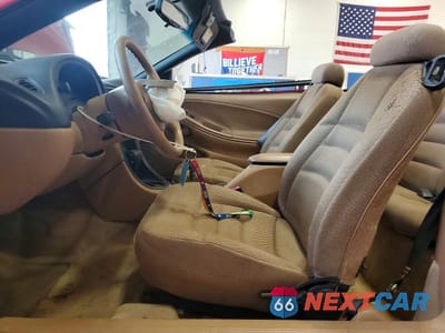 Zdjęcie 7 z 12 samochodu: 1998 FORD MUSTANG VIN:1FAFP4443WF227169 - miniatura