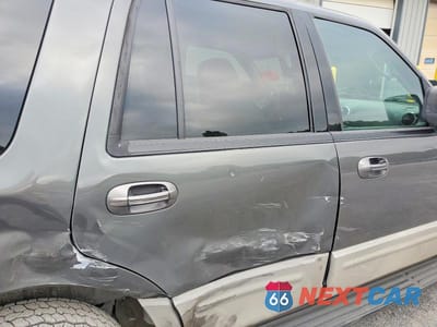 Zdjęcie 11 z 13 samochodu: 2003 FORD EXPEDITION XLT VIN:1FMPU16LX3LA95496 - miniatura