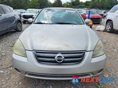 Piąte zdjęcie samochodu w środku: 2003 NISSAN ALTIMA BASE/S/SL VIN:1N4AL11D63C331144 - miniatura