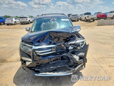 Piąte zdjęcie samochodu w środku: 2017 HONDA PILOT ELITE VIN:5FNYF6H01HB047642 - miniatura