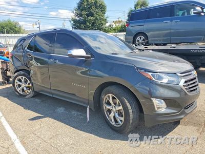Czwarte zdjęcie samochodu z boku: 2021 CHEVROLET EQUINOX PREMIER VIN:2GNAXNEV7M6138057 - miniatura