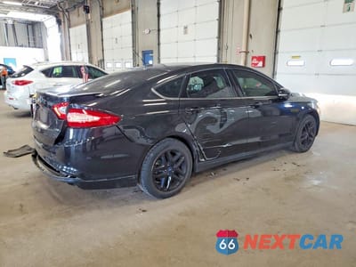 Trzecie zdjęcie samochodu z tyłu: 2014 FORD FUSION SE VIN:1FA6P0H76E5374801 - miniatura