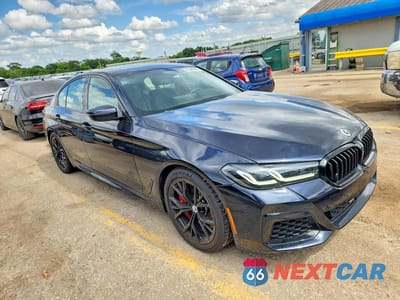 Czwarte zdjęcie samochodu z boku: 2023 BMW M550XI VIN:WBA13BK0XPCL25460 - miniatura
