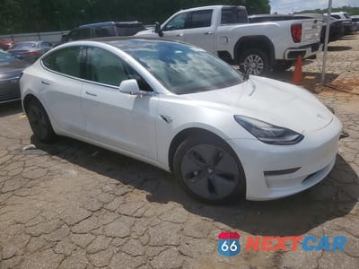 Czwarte zdjęcie samochodu z boku: 2020 TESLA MODEL 3 VIN:5YJ3E1EA9LF615609 - miniatura