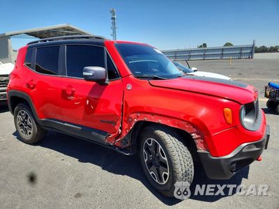 Czwarte zdjęcie samochodu z boku: 2015 JEEP RENEGADE TRAILHAWK VIN:ZACCJBCT0FPB87254 - miniatura