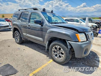 Czwarte zdjęcie samochodu z boku: 2015 NISSAN XTERRA PRO-4X VIN:5N1AN0NW5FN658150 - miniatura