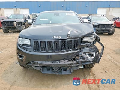 Piąte zdjęcie samochodu w środku: 2015 JEEP GRAND CHEROKEE OVERLAND VIN:1C4RJFCG3FC718472 - miniatura