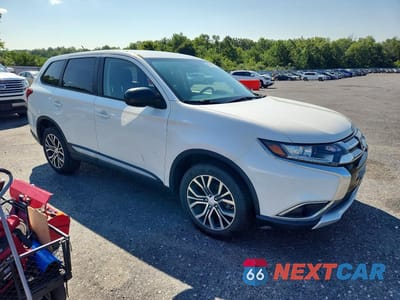 Czwarte zdjęcie samochodu z boku: 2016 MITSUBISHI OUTLANDER ES VIN:JA4AD2A32GZ017203 - miniatura