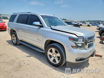 Czwarte zdjęcie samochodu z boku: 2015 CHEVROLET TAHOE C1500 LTZ VIN:1GNSCCKC6FR718446 - miniatura