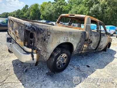 Trzecie zdjęcie samochodu z tyłu: 2016 RAM 2500 SLT VIN:3C6TR4DT9GG389765 - miniatura